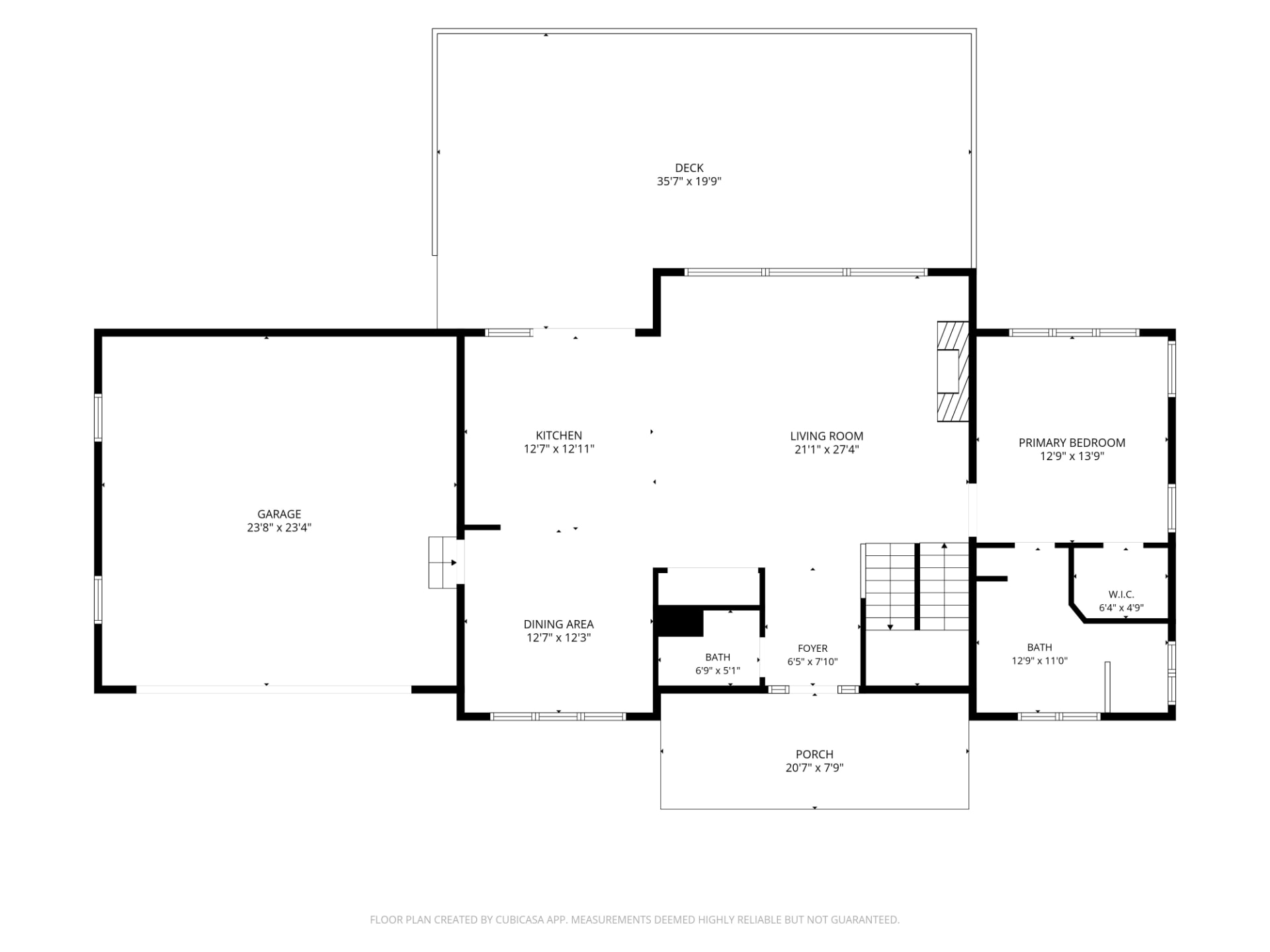 Measured 2D floor plan showing garage, kitchen, living room, dining area, primary bedroom, baths, porch and deck with dimensions
